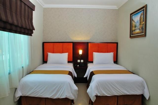 Feodora Airport Hotel Palembang Cameră foto